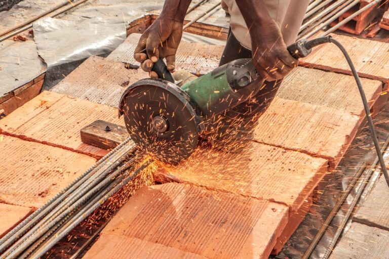 Angle Grinding - Construct a house in Uganda